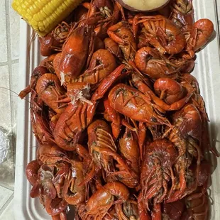 Boiled crawfish, potatoes and corn.