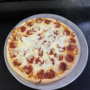 Large pepperoni extra cheese pizza