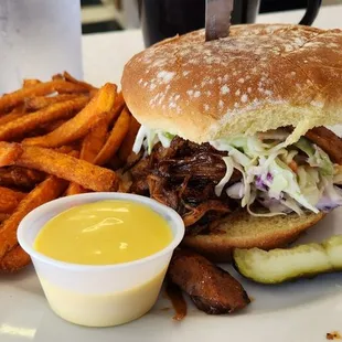 Sweet potato fries and pulled pork sandwich.