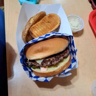 a hamburger and waffle fries