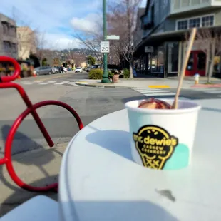 Eating a yummy mocha chip sundae in front of Mr Dewey's in Albany