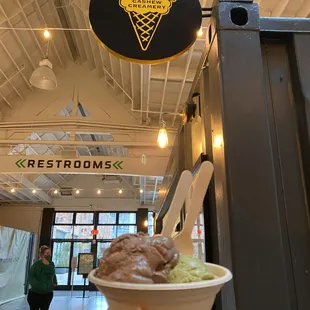 Double scoop in front of the sign!