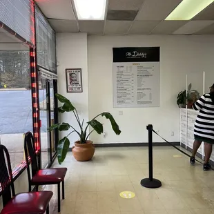 a woman standing in a waiting room