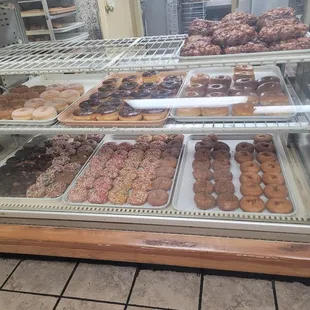 a display case full of donuts