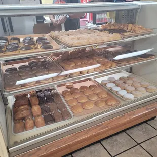 a display case full of donuts