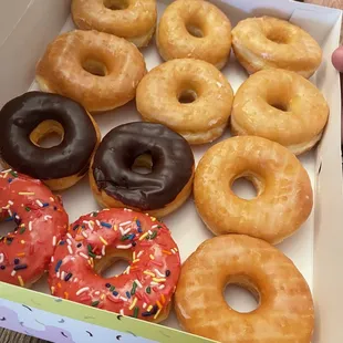 Donuts first thing in the morning. Had to wrestle the box out of the kids hands just to take a pic before they attacked the box.