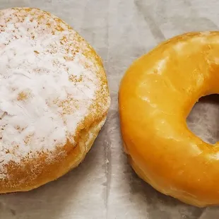 Custard filled donut ($3.09) on da left, and glazed donut ($2.15) on da right.
