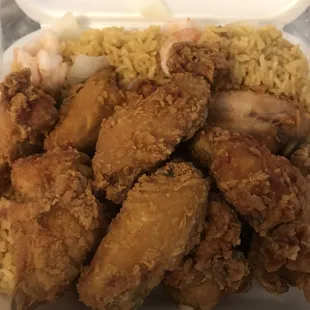 Plain fried chicken wings with shrimp fried rice.