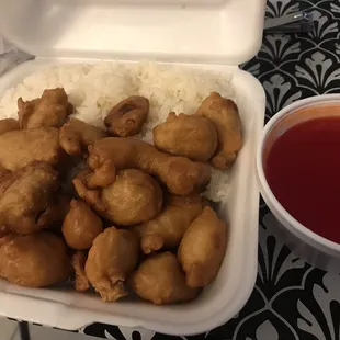 Sweet and sour pork with white rice and sauce