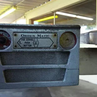 a parking meter in a parking garage