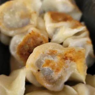  a closeup of a bowl of dumplings