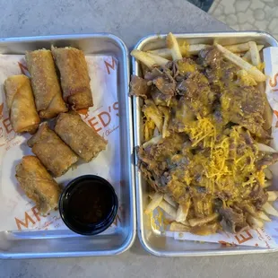 Boudin Egg Rolls and Debris Fries... both of these are LEGIT!