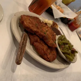 Two 6 Oz. Breaded Or Grilled Pork Chops