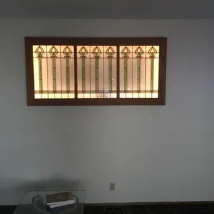 Mr. Electric added lights inside of case and brightened it up.