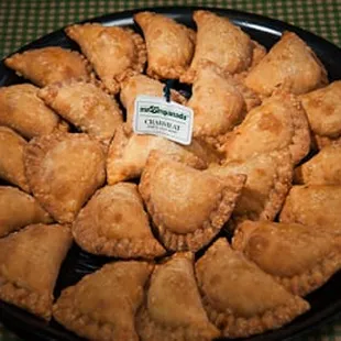 a plate of empanadas