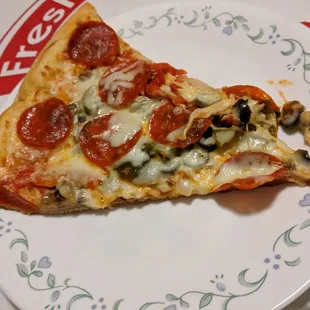 Slice of Supreme Pizza.