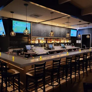 a bar with a lot of seating