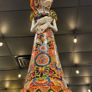 a woman in a brightly colored dress