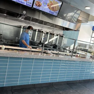a man working in the kitchen