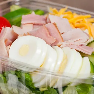 a salad in a plastic container