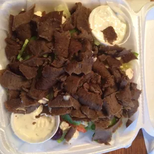 Yummy gyro salad to go - love all the meat with sauce on side