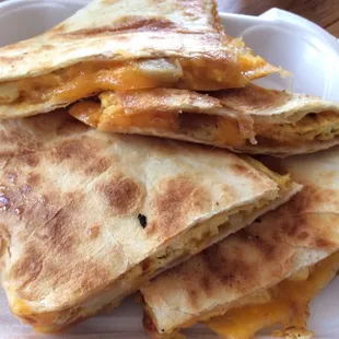 breakfast quesadilla--egg, bacon, potatoes, red peppers, and cheese. Really good!