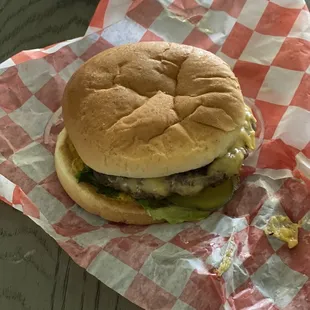 Weak cheeseburger for $8.50, with no sides, no fries, no chips, nothing.