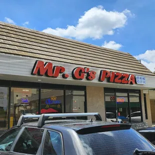 Store front from parking lot.