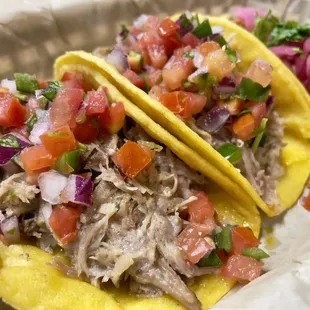 First two are carnitas tacos