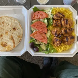 Chicken kebab plate with salad and a Diet Coke.