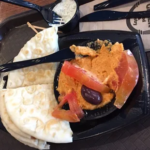 Red Pepper Hummus (minus two pieces of pita we already ate.)