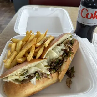 Philly. Crispy bread on the outside but soft on the inside. $10. Great prices.