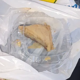 a sandwich in a plastic container