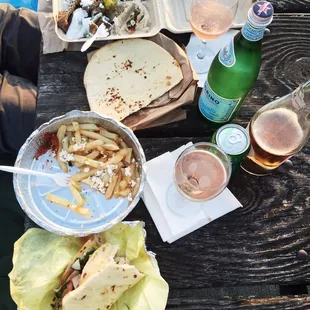 golden gardens sunset + chicken shawarma sandwich and gyro&apos;s plate = heaven on earth