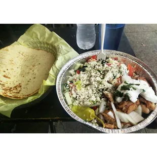 Chicken shawarma salad and pita.