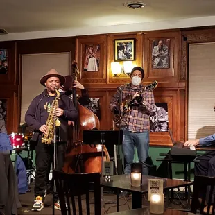 a jazz band performing in a pub