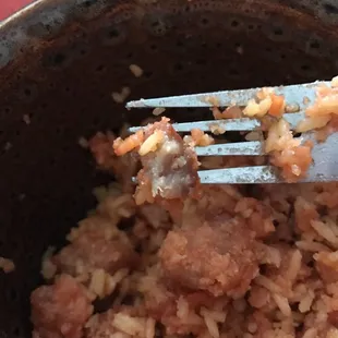 Part of the inside of the sesame chicken. It's black. And disgusting.