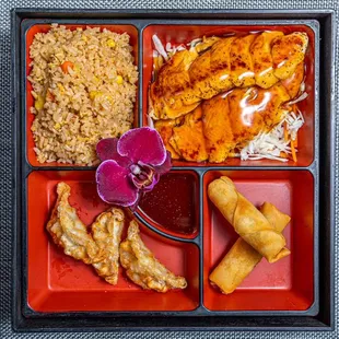  a bento box of food