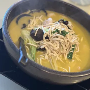 a bowl of soup with noodles