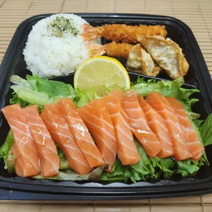 Salmon sashimi Salad 2pcs Shrimp  2pcs mandu. Rice