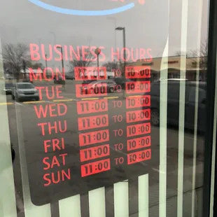 a business hours sign