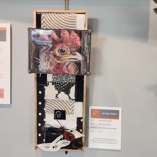 a picture of a chicken on display