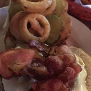 a bacon and onion rings sandwich
