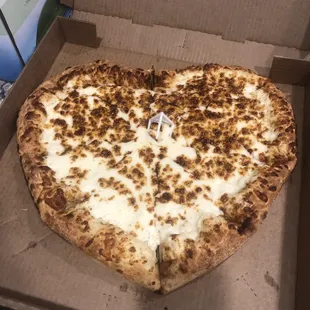 Heart shaped white sauce cheese pizza