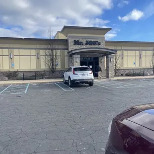 a car parked in front of a building