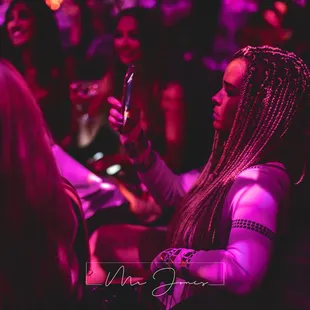 a woman with dreadlocks at a party