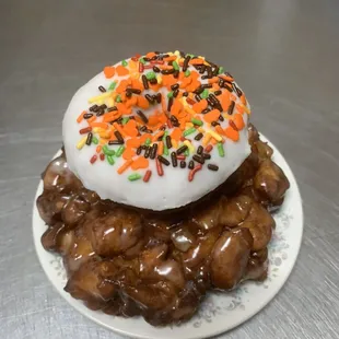 a donut covered in frosting and sprinkles