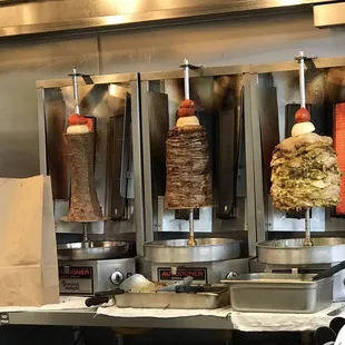 a man preparing food in a commercial kitchen