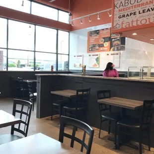 a woman sitting at the counter