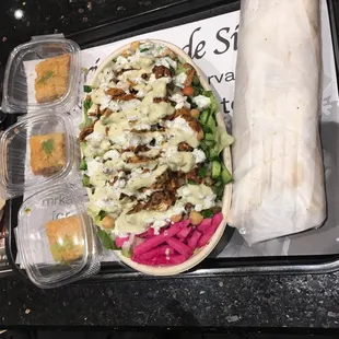 Baklava on left, Chicken Shawarma Bowl and Chicken Shawarma Wrap